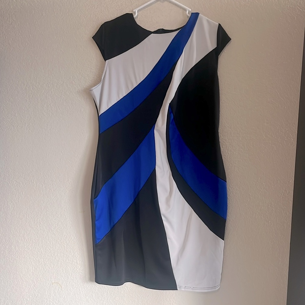 Blue black and white colorblock dress with sweeping curves